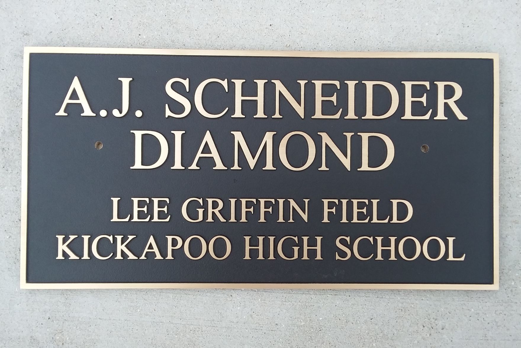 A.J. Schneider bronze plaque